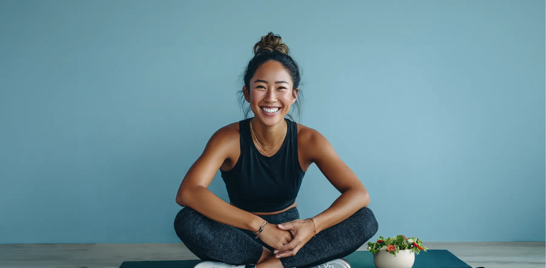 Women sitting in yoga mat